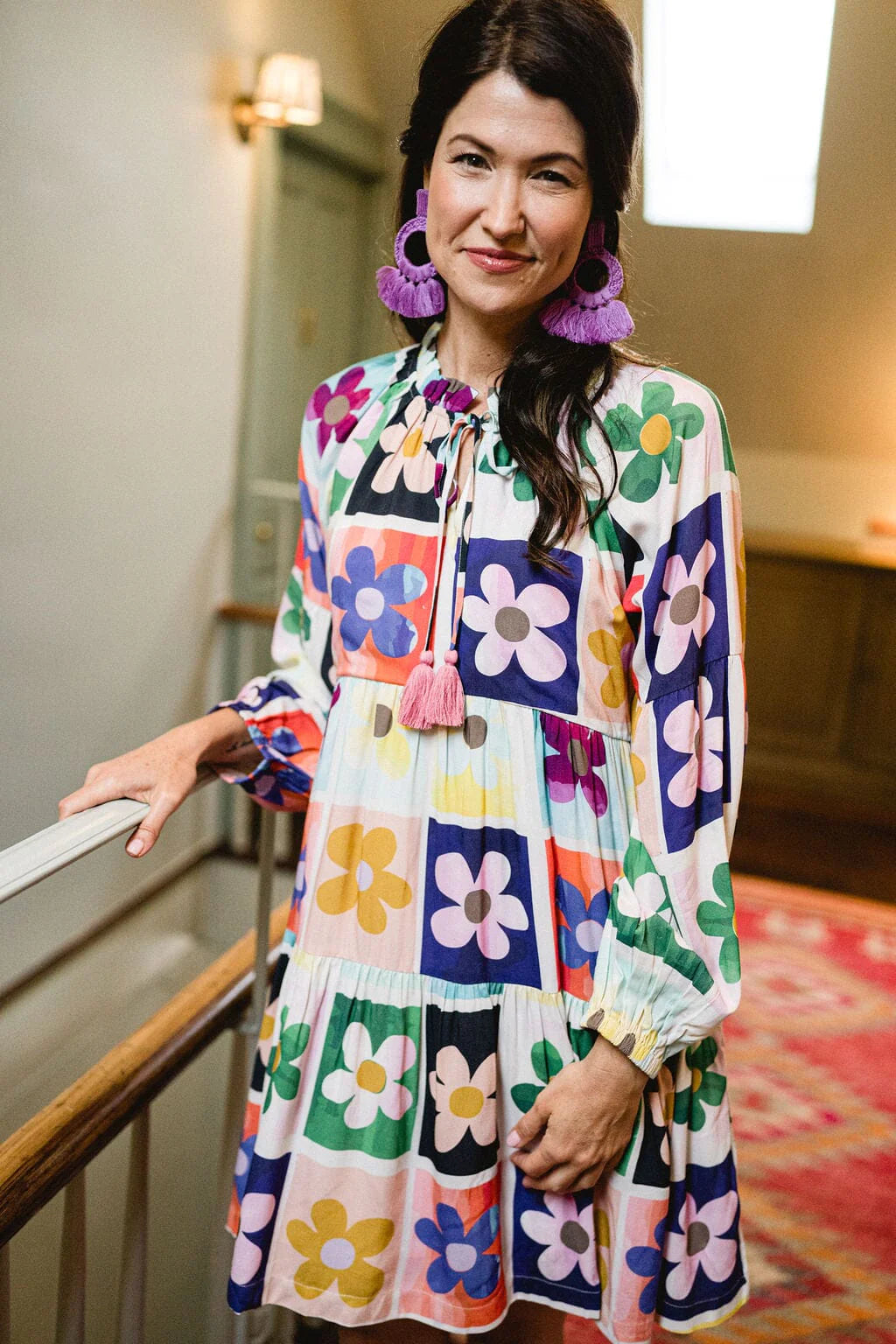 Woman wearing Briton Courts Ollie Flower Power dress.