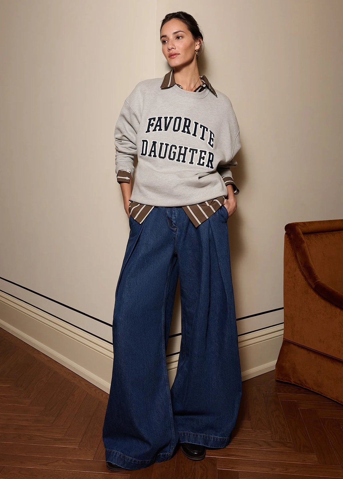 Favorite Daughter Pleats for Days jeans styled casually with graphic sweatshirt
