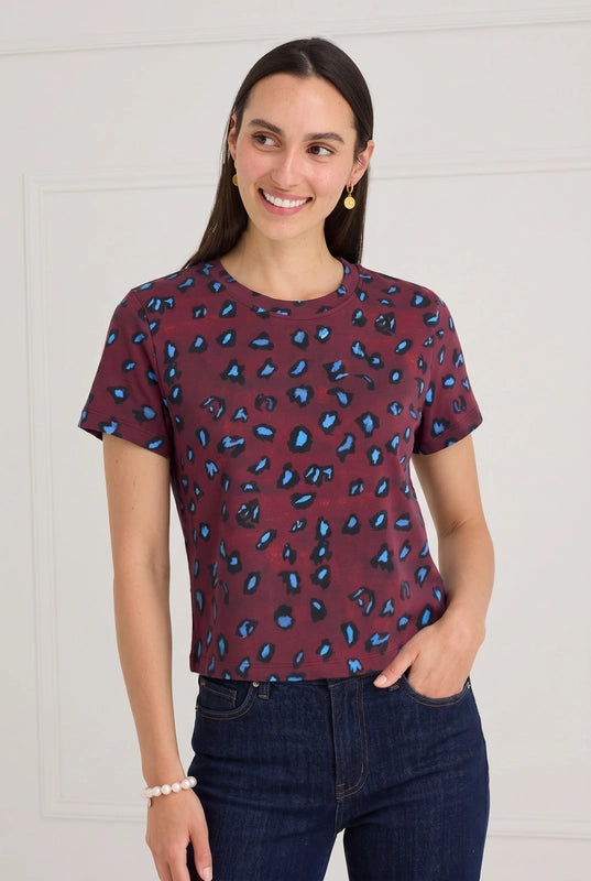 ALIVIA Cleo Tee burgundy short sleeve crewneck top with blue and black abstract print styled with denim jeans
