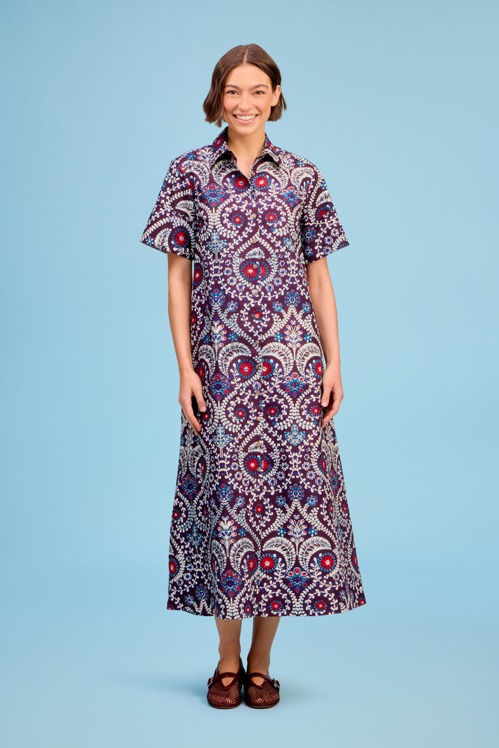 LIVRO Gibbons Dress in multicolor medallion print featuring a collared neckline, short sleeves and flowing maxi silhouette at Harringtons Boutique.