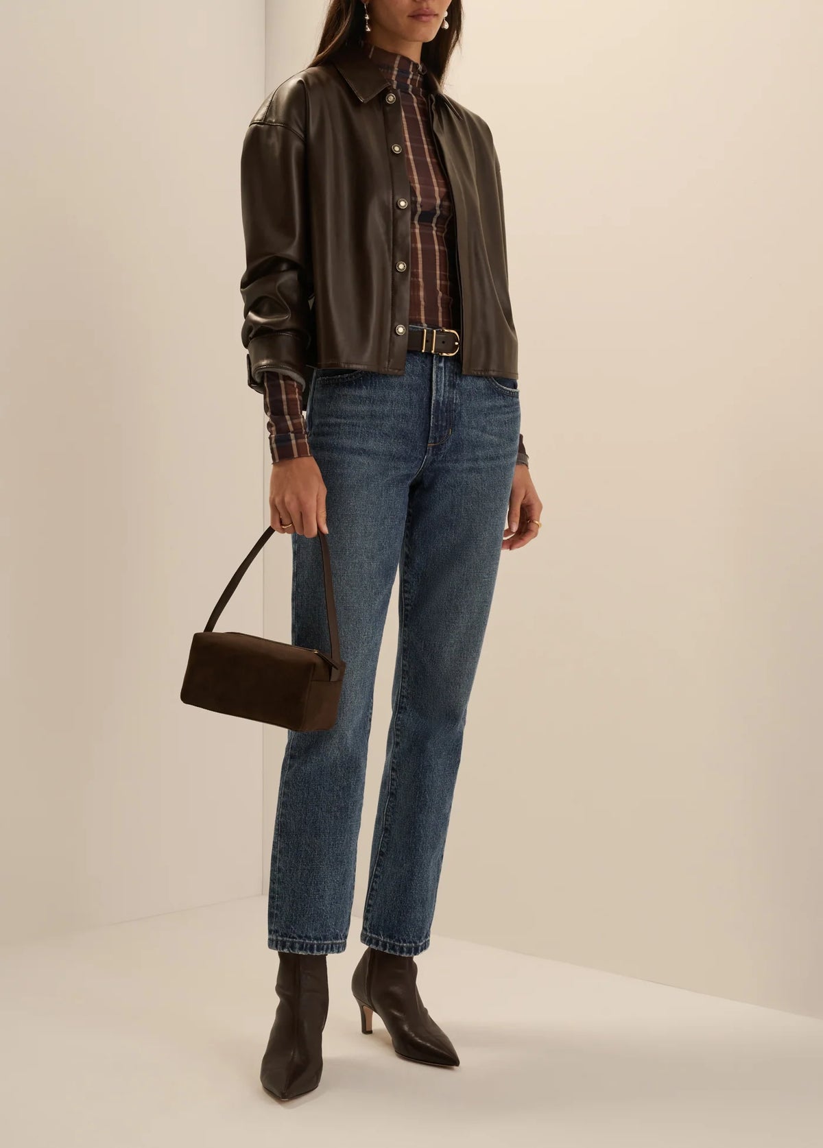 Chocolate brown Favorite Daughter Leather Brady Shirt styled with blue denim and a matching brown handbag.