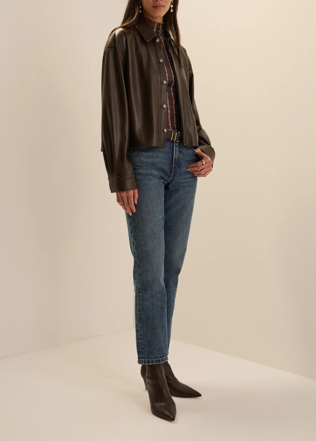 Favorite Daughter Leather Brady Shirt in chocolate brown styled with blue jeans and ankle boots.