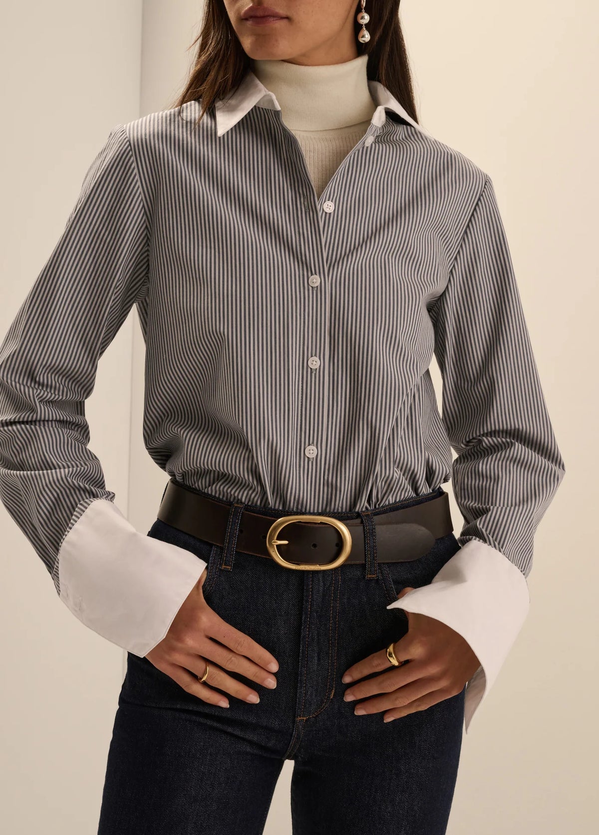 Favorite Daughter Cuffed Statement Shirt in gray pinstripes with contrasting white collar and oversized cuffs, styled with dark denim.