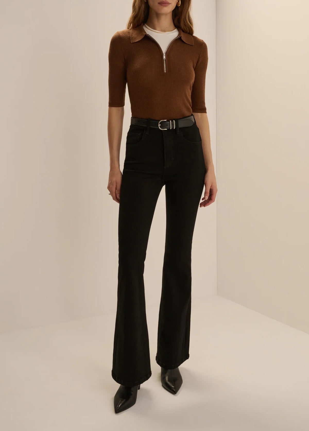 Favorite Daughter Downtown Polo in chocolate brown styled with black high-waisted trousers at Harringtons Boutique.