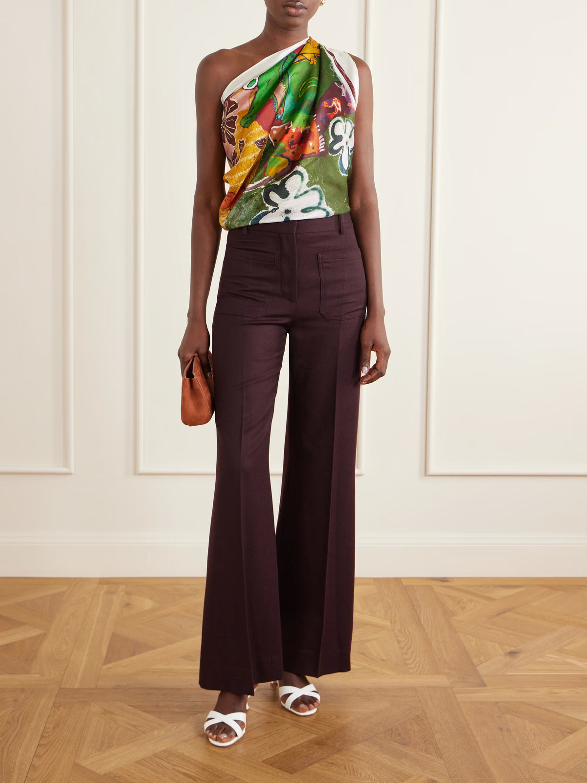 ALEMAIS Mlak Silk Scarf styled as a colorful halter top with brown wide-leg pants.