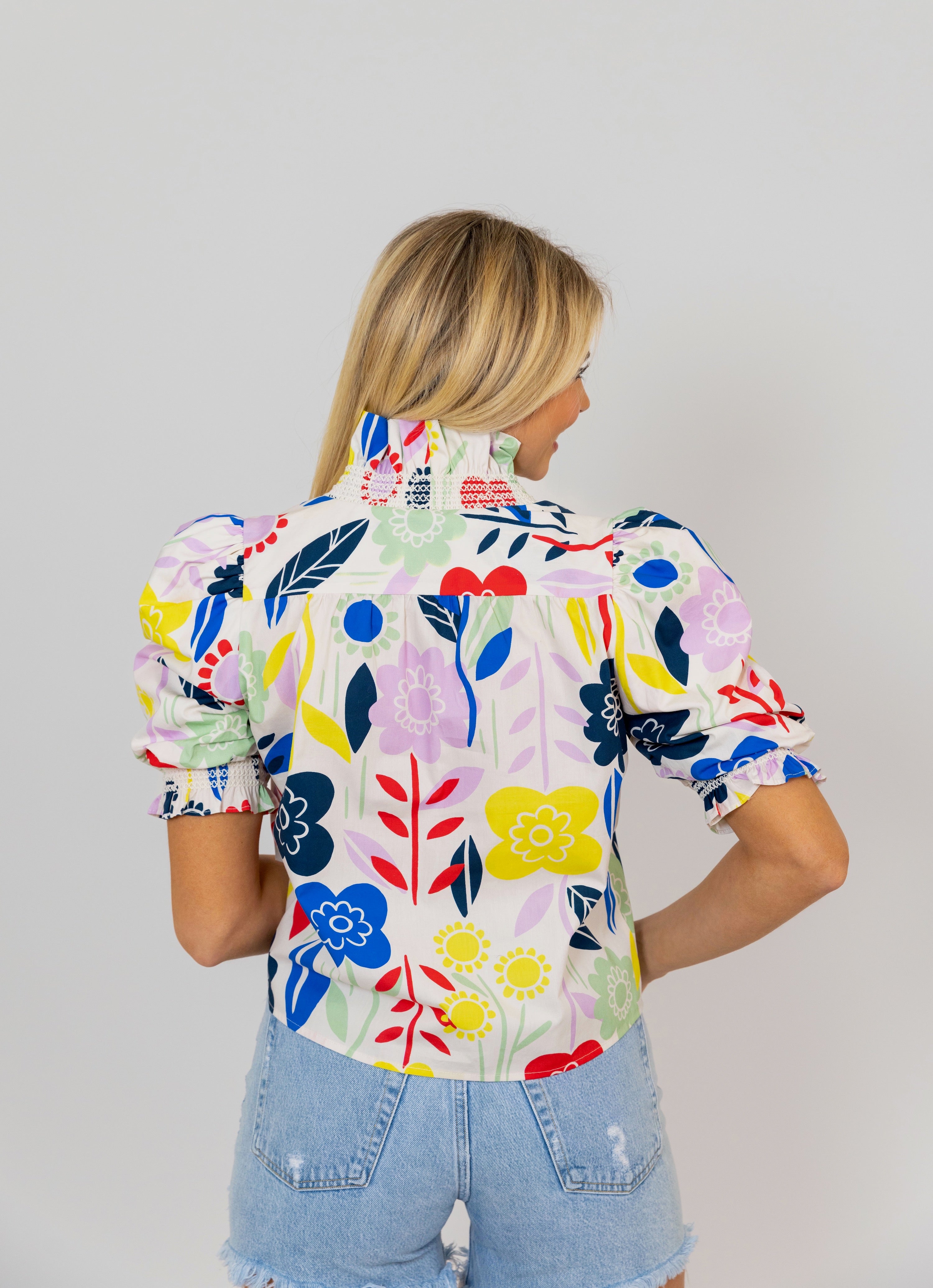 ABSTRACT FLORAL RUFFLE TOP
