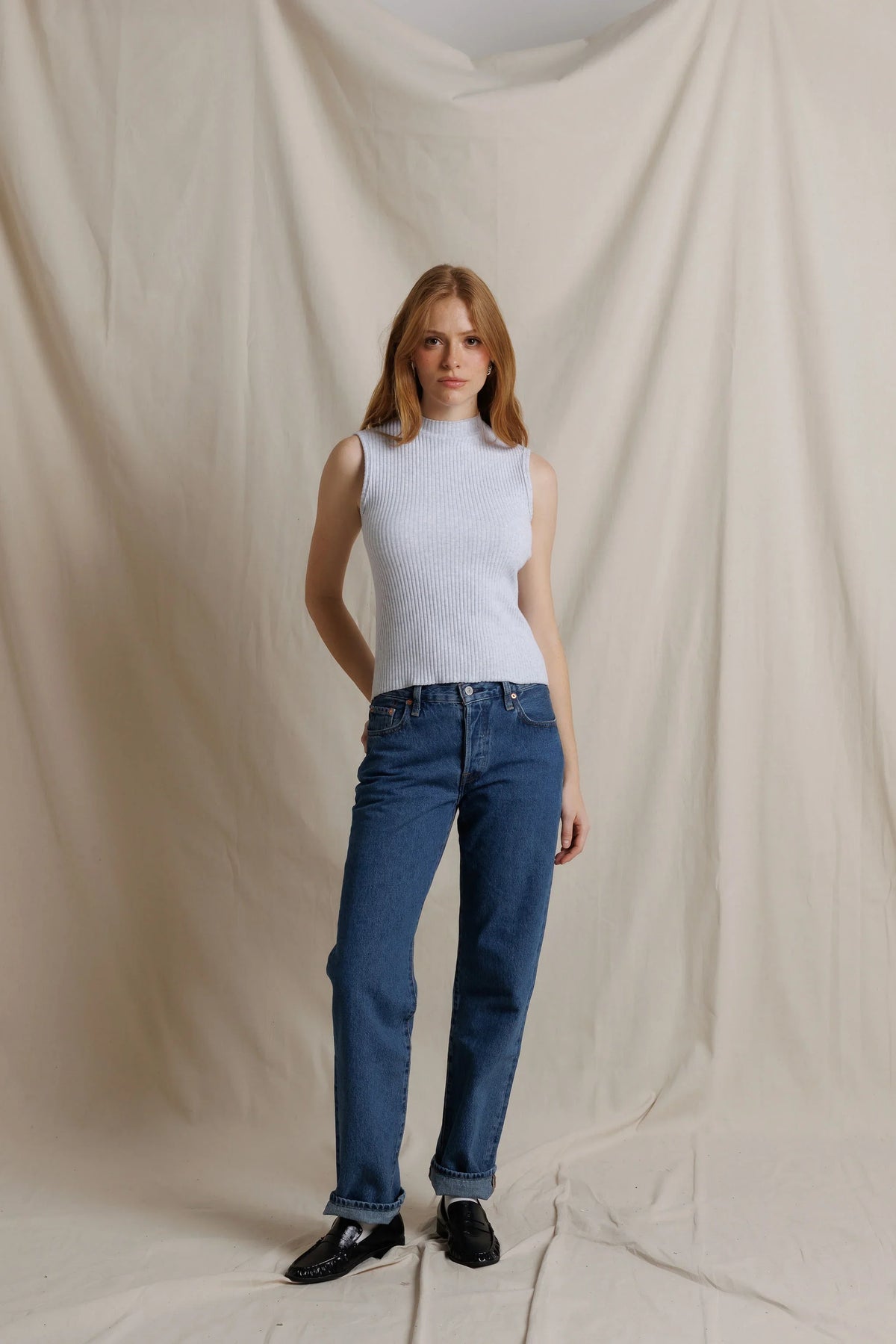 Perfect White Tee Violet knit sweater front view styled with jeans