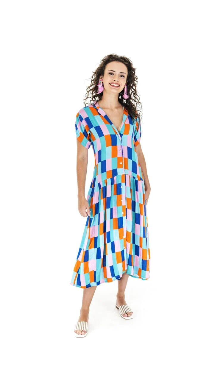 Woman wearing Briton Courts Tetris maxi dress.