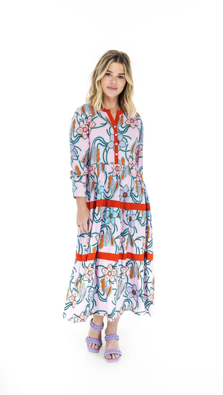 Woman wearing Tiered Monet Garden maxi dress.