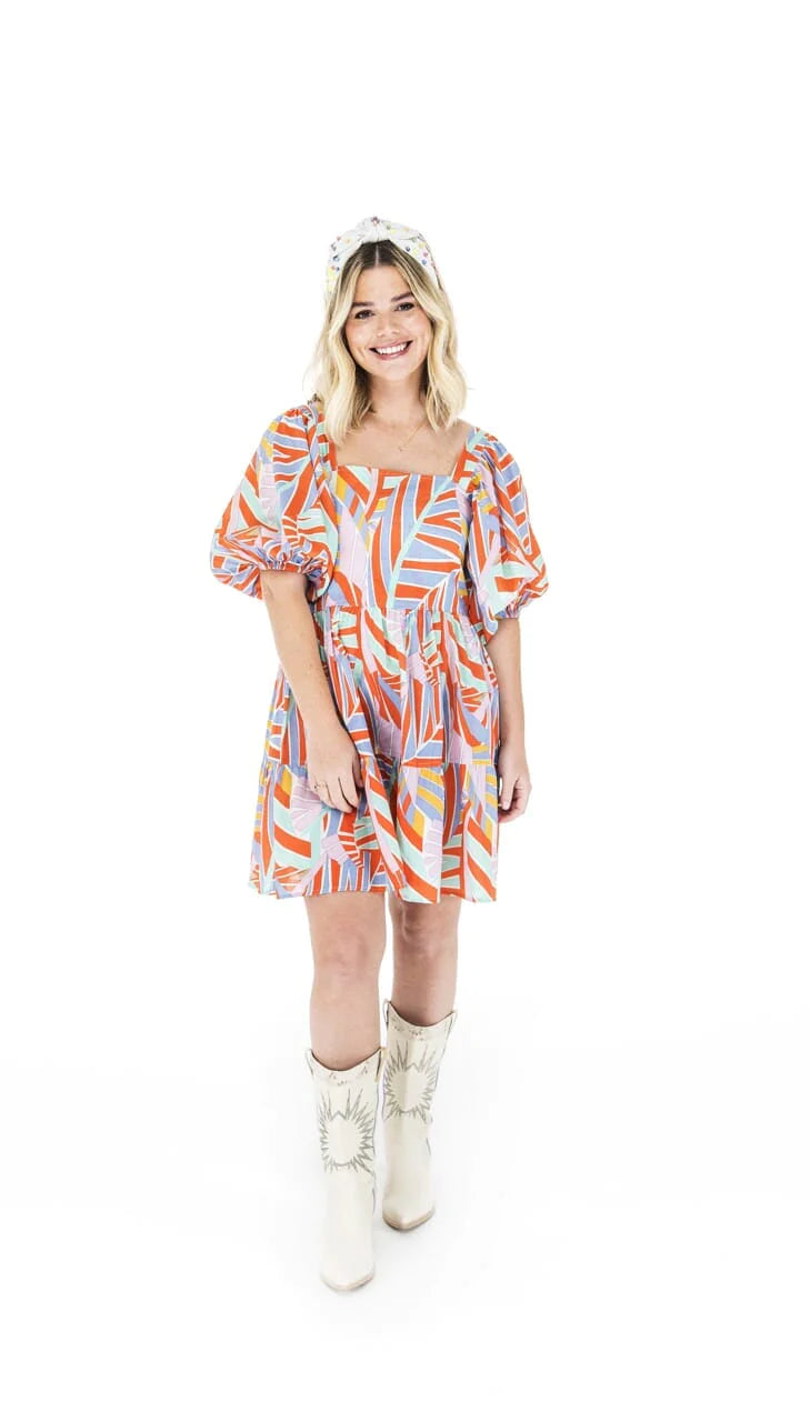 Woman wearing Briton Courts Palm dress.